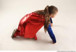 VIKY SUPERGIRL KNEELING POSE 2